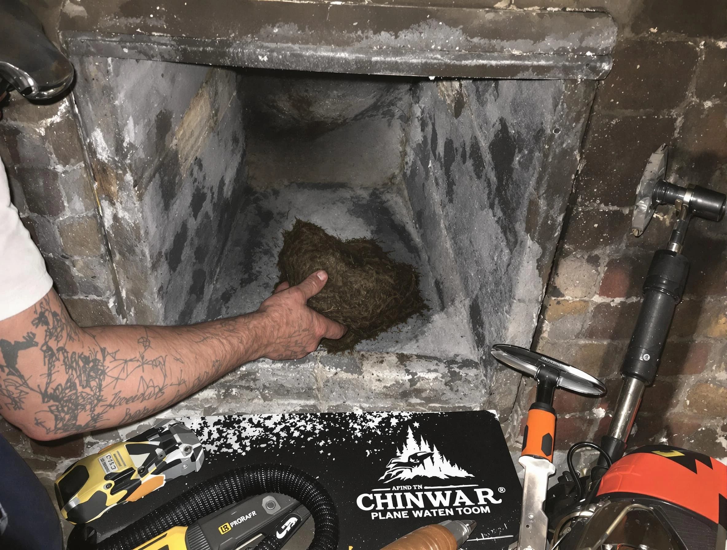 Lovejoy Chimney Sweep safely removing debris and screening chimney in Lovejoy, GA